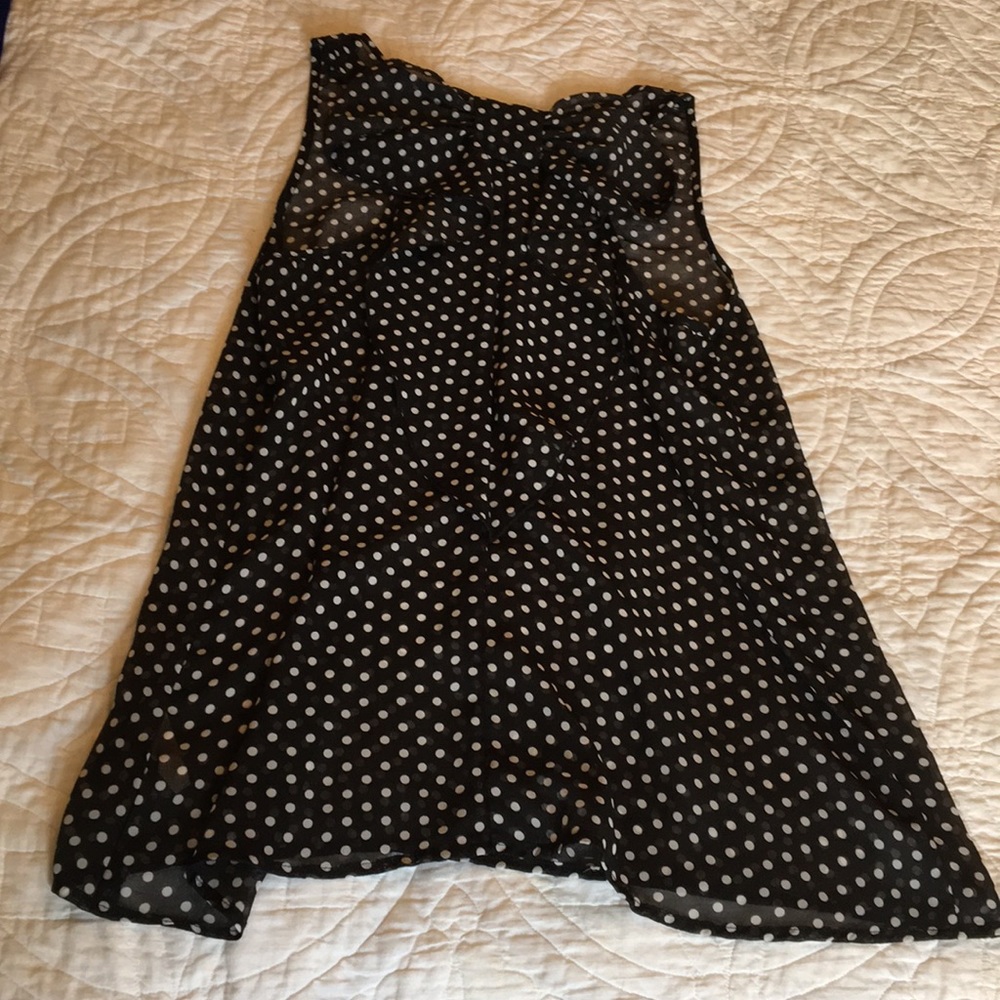 Sleeveless polka dot top with big bow